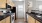 a kitchen with wooden cabinets