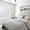 bed in a natural lit room
