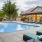 pool with tropical landscaping