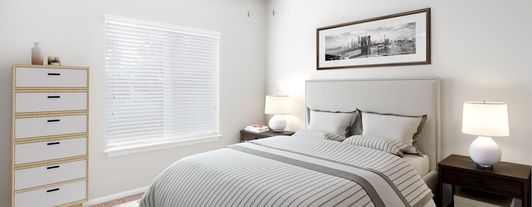 a bedroom with a fan