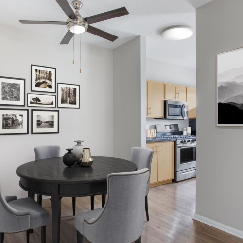 Find your perfect fit at Brooks Landing a kitchen with a table and chairs