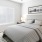 a bedroom with a fan
